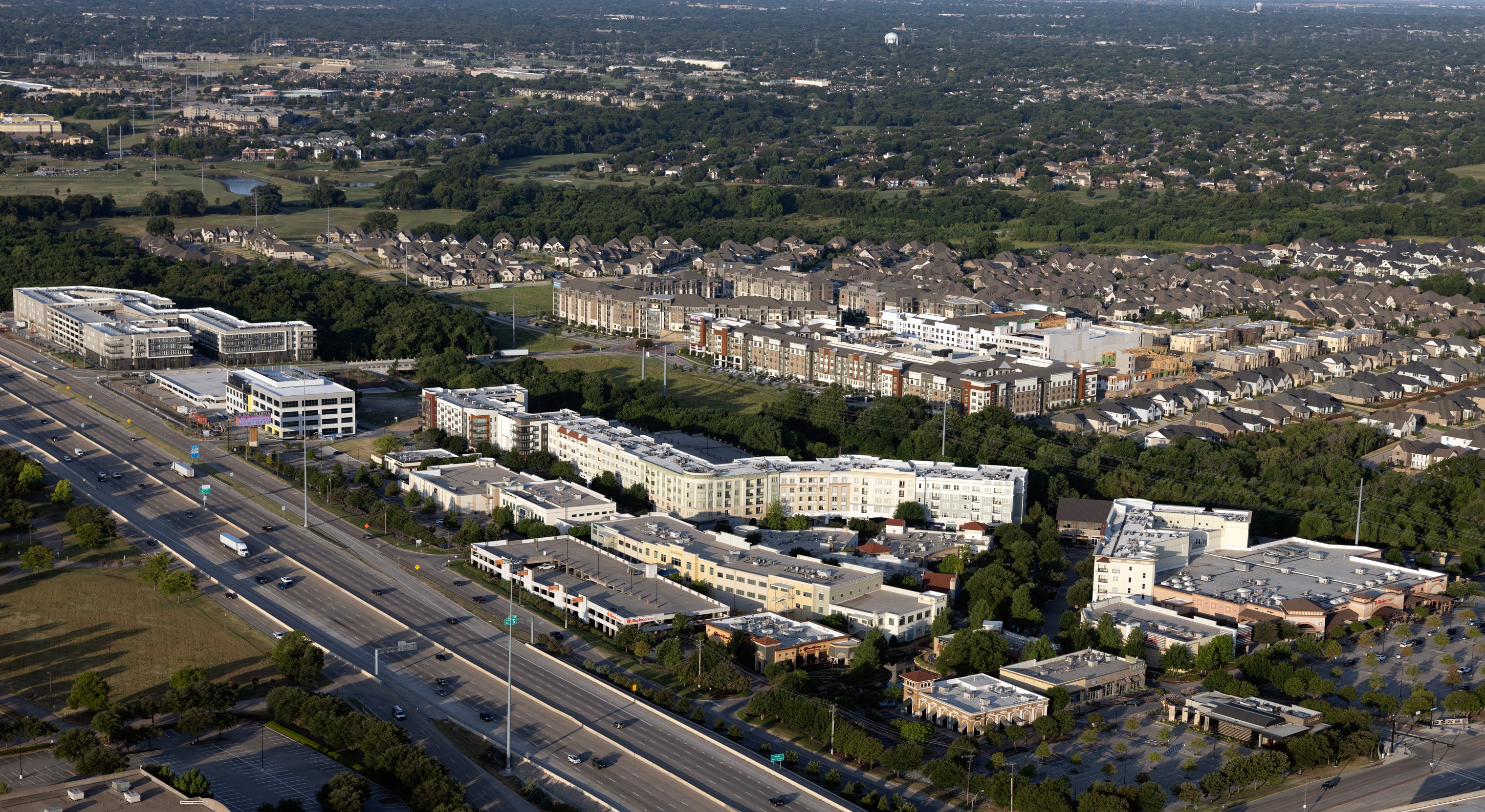 Aerial of Watters Creek District with golf course